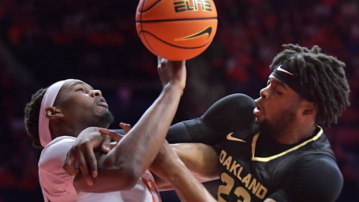 Nov 13, 2024; Champaign, Illinois, USA; Illinois Fighting Illini forward Morez Johnson Jr. (21) and Oakland Golden Grizzlies forward Allen Mukeba (23) attempt to get a loose ball during the first half at State Farm Center. Mandatory Credit: Ron Johnson-Imagn Images Nov 13, 2024; Champaign, Illinois, USA; Illinois Fighting Illini forward Morez Johnson Jr. (21) and Oakland Golden Grizzlies forward Allen Mukeba (23) attempt to get a loose ball during the first half at State Farm Center. Mandatory Credit: Ron Johnson-Imagn Images