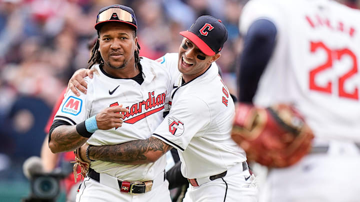 Cleveland Guardians third baseman José Ramírez (11), left, and shortstop Brayan Rocchio (4) celebrates 7-3 win over Detroit Tigers at Game 5 of ALDS at Progressive Field in Cleveland, Ohio on Saturday, Oct. 12, 2024.