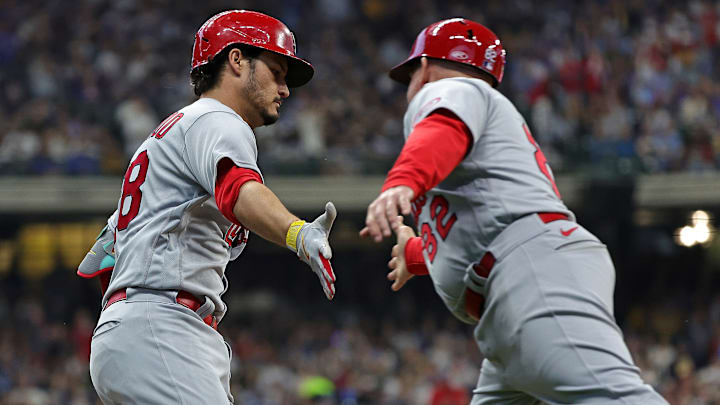 Nolan Arenado greets Stubby Clapp.