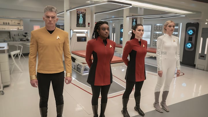 L to R Anson Mount as Capt. Pike, Celia Rose Gooding as Uhura, Christina Chong as Laan and Jess Bush as Chapel in season 3 , Episode 8 of Strange New Worlds streaming on Paramount+. Photo Credit: Marni GrossmanParamount+