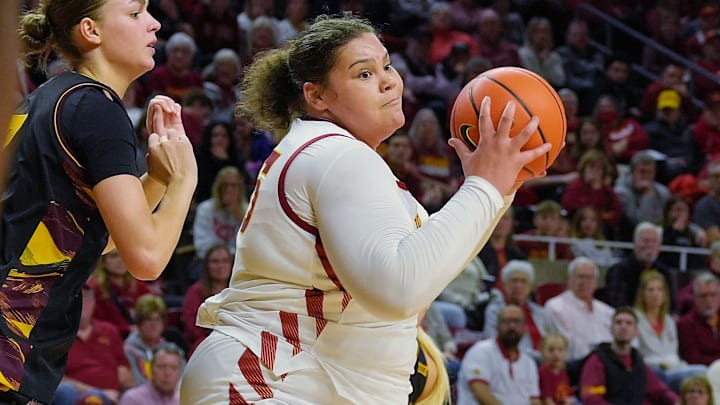 Iowa State Cyclones' center Audi Crooks (55) drives to the basket around Arizona State Sun Devils center Martina Fantini (7) during the second quarter in the Big-12 women’s basketball at Hilton Coliseum on Feb. 18, 2026, in Ames, Iowa