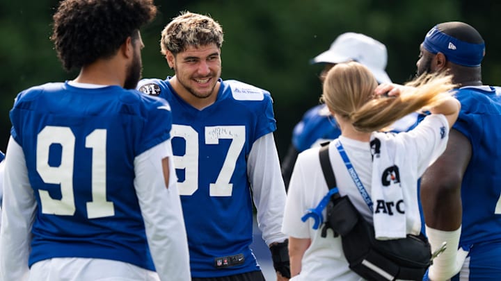 Indianapolis Colts defensive end Laiatu Latu (97) laughs with defensive linemen Friday, July 25, 2025, ahead of training camp held at Grand Park in Westfield.