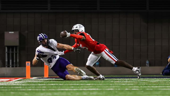 Sep 6, 2025; Tucson, Arizona, USA; Arizona Wildcats defensive back Michael Dansby (25) blocks a pass intended for Weber State Wildcats tight end Noah Bennet (84) during the third quarter of the game at Arizona Stadium. Mandatory Credit: Aryanna Frank-Imagn Images