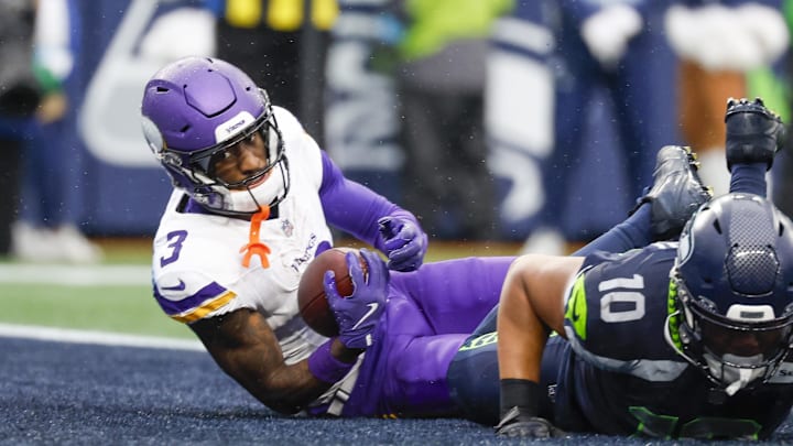 Dec 22, 2024; Seattle, Washington, USA; Minnesota Vikings wide receiver Jordan Addison (3) looks up after catching a touchdown pass in the end zone against the Seattle Seahawks during the first quarter at Lumen Field. Mandatory Credit: Joe Nicholson-Imagn Images