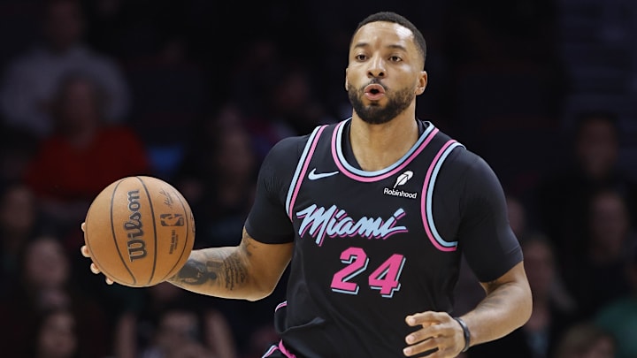 Jan 15, 2026; Miami, Florida, USA; Miami Heat guard Norman Powell (24) brings the ball up court against the Boston Celtics during the first half at Kaseya Center. Mandatory Credit: Rhona Wise-Imagn Images