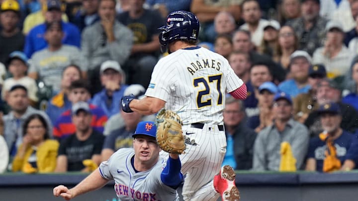 Oct 3, 2024; Milwaukee, Wisconsin, USA; Milwaukee Brewers shortstop Willy Adames (27) beats New York Mets first base Pete Alonso (20) to first during the fourth inning of Game 3 of National League wild-card series on Thursday October 3, 2024 at American Family Field in Milwaukee, Wis. Oct 3, 2024; Milwaukee, Wisconsin, USA; Milwaukee Brewers shortstop Willy Adames (27) beats New York Mets first base Pete Alonso (20) to first during the fourth inning of Game 3 of National League wild-card series on Thursday October 3, 2024 at American Family Field in Milwaukee, Wis.