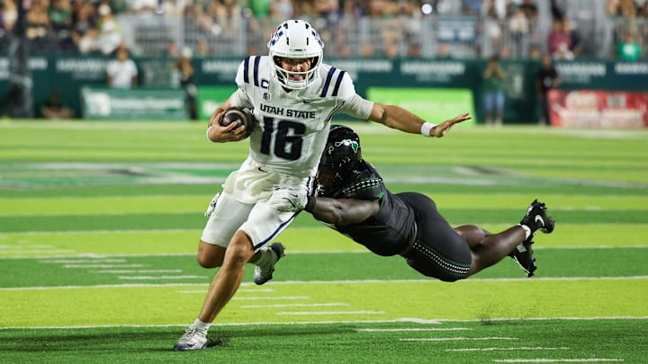 Bryson Barnes and Utah State are favored against Washington State on Monday.