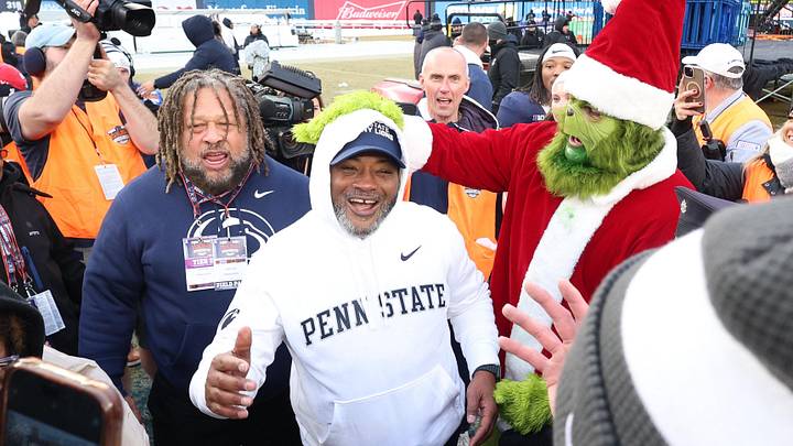 Penn State Nittany Lions interim head coach Terry Smith celebrates after defeating the Clemson Tigers in the 2025 Pinstripe Bowl at Yankee Stadium. Penn State Nittany Lions interim head coach Terry Smith celebrates after defeating the Clemson Tigers in the 2025 Pinstripe Bowl at Yankee Stadium.