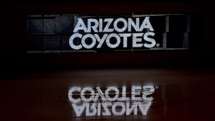 Oct 14, 2017; Glendale, AZ, USA; The Arizona Coyotes logo is reflected on the ice prior to the game