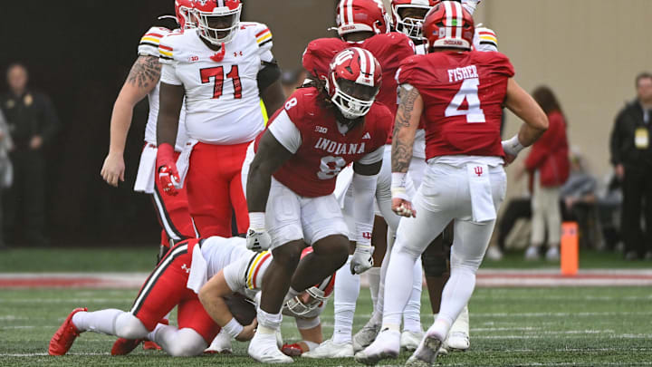 Indiana Hoosiers defensive lineman CJ West (8) celebrates after bringing down Maryland Terrapins quarterback Billy Edwards Jr. (9) during the first half at Memorial Stadium.