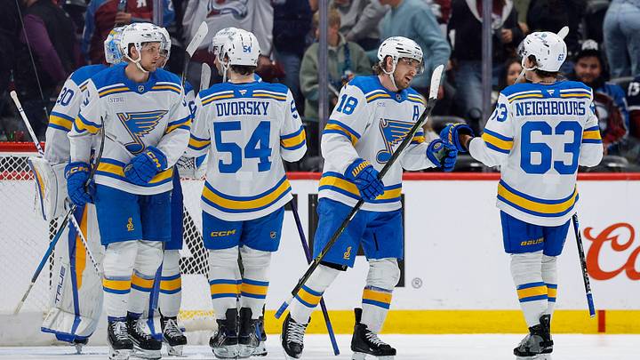 Apr 5, 2026; Denver, Colorado, USA; St. Louis Blues center Robert Thomas (18) reacts with left wing Jake Neighbours (63) and right wing Dalibor Dvorsky (54) after the game against the Colorado Avalanche at Ball Arena. Mandatory Credit: Isaiah J. Downing-Imagn Images Apr 5, 2026; Denver, Colorado, USA; St. Louis Blues center Robert Thomas (18) reacts with left wing Jake Neighbours (63) and right wing Dalibor Dvorsky (54) after the game against the Colorado Avalanche at Ball Arena. Mandatory Credit: Isaiah J. Downing-Imagn Images