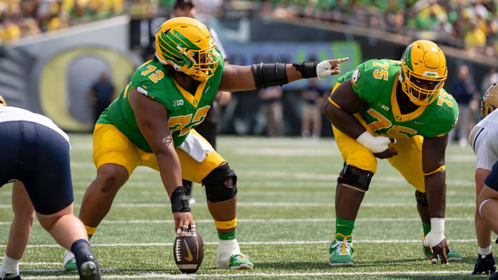 Oregon offensive linemen Iapani Laloulu, left, and Emmanuel Pregnon line up as the Oregon Ducks host the Montana State Bobcats on Aug. 30, 2025, at Autzen Stadium in Eugene, Oregon. Oregon offensive linemen Iapani Laloulu, left, and Emmanuel Pregnon line up as the Oregon Ducks host the Montana State Bobcats on Aug. 30, 2025, at Autzen Stadium in Eugene, Oregon.