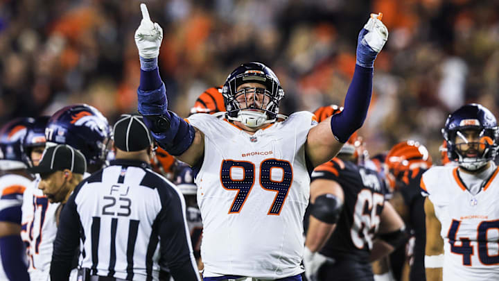 Dec 28, 2024; Cincinnati, Ohio, USA; Denver Broncos defensive end Zach Allen (99) reacts after a play against the Cincinnati Bengals in the second half at Paycor Stadium. 