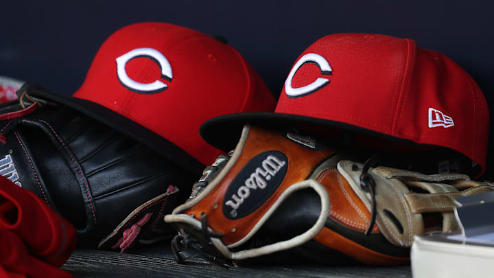 Cincinnati Reds hats and gloves