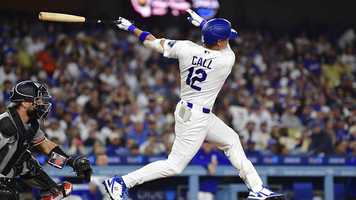 May 13, 2026: Los Angeles Dodgers left fielder Alex Call (12) hits a sacrifice RBI in the fourth inning against the San Francisco Giants at Dodger Stadium.