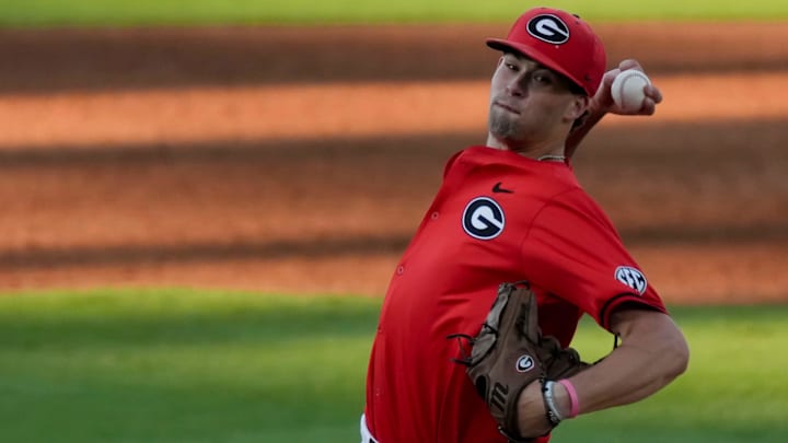 May 21, 2025; Hoover, AL, USA; Georgia pitcher JT Quinn (22) makes a pitch during the game with Oklahoma in the second round of the SEC Baseball Tournament at the Hoover Met. May 21, 2025; Hoover, AL, USA; Georgia pitcher JT Quinn (22) makes a pitch during the game with Oklahoma in the second round of the SEC Baseball Tournament at the Hoover Met.