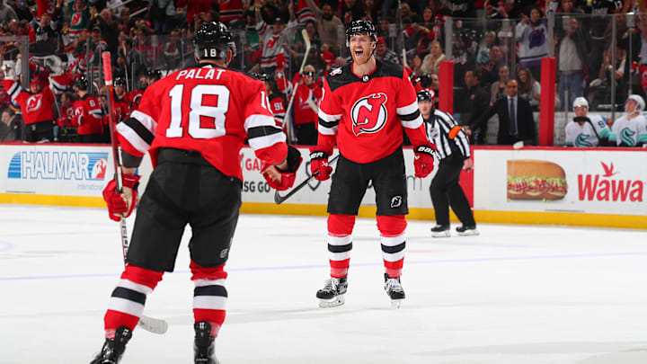 Dougie Hamilton, Ondrej Palat skate for the New Jersey Devils