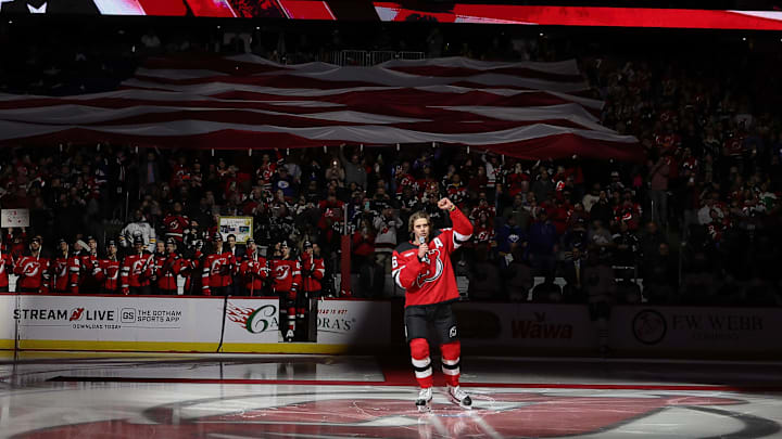 New Jersey Devils center Jack Hughes (86) is honored for Team USA’s gold medal winning performance at the 2026 Winter Olympics: Ed Mulholland-Imagn Images
