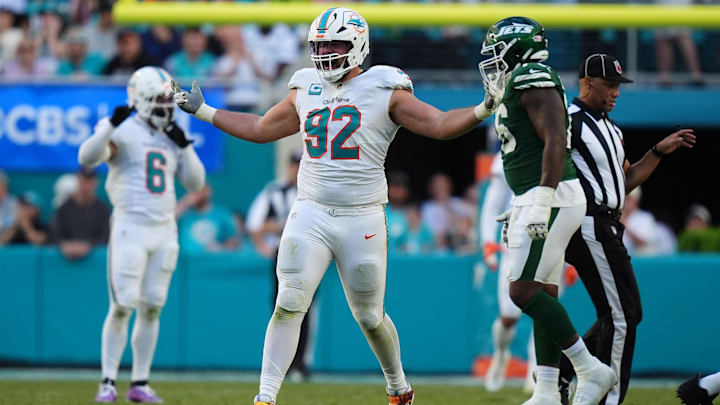 Miami Dolphins defensive tackle Zach Sieler (92) celebrates after sacking New York Jets quarterback Aaron Rodgers (8, not pictured) during the second half at Hard Rock Stadium.