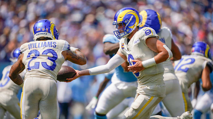 Los Angeles Rams quarterback Matthew Stafford (9) hands off to running back Kyren Williams (23) during the second quarter at Nissan Stadium in Nashville, Tenn., Sunday, Sept. 14, 2025. Los Angeles Rams quarterback Matthew Stafford (9) hands off to running back Kyren Williams (23) during the second quarter at Nissan Stadium in Nashville, Tenn., Sunday, Sept. 14, 2025.