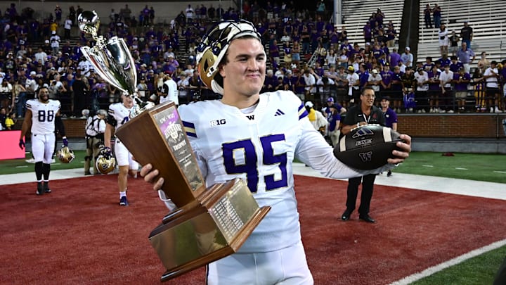 Sep 20, 2025; Pullman, Washington, USA; Washington Huskies place kicker Grady Gross (95) celebrates after a game against the Washington State Cougars at Gesa Field at Martin Stadium. Washington Huskies won 59-24. Mandatory Credit: James Snook-Imagn Images