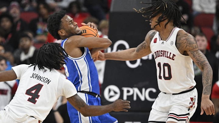 Jan 23, 2024; Louisville, Kentucky, USA;  Duke Blue Devils guard Jeremy Roach (3) battles Louisville