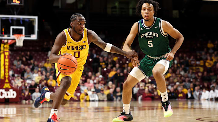 Nov 18, 2025; Minneapolis, Minnesota, USA; Minnesota Golden Gophers guard Chansey Willis Jr. (0) works around Chicago State Cougars guard Chauncey Gibson (5) during the first half at Williams Arena. Mandatory Credit: Matt Krohn-Imagn Images