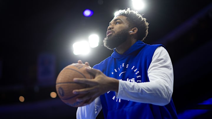 Nov 12, 2024; Philadelphia, Pennsylvania, USA; New York Knicks center Karl-Anthony Towns warms up before action against the Philadelphia 76ers at Wells Fargo Center. Mandatory Credit: Bill Streicher-Imagn Images