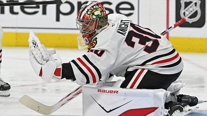 Mar 26, 2026; Philadelphia, Pennsylvania, USA; Chicago Blackhawks goaltender Spencer Knight (30) makes a save against the Philadelphia Flyers during the third period at Xfinity Mobile Arena. Mandatory Credit: Eric Hartline-Imagn Images