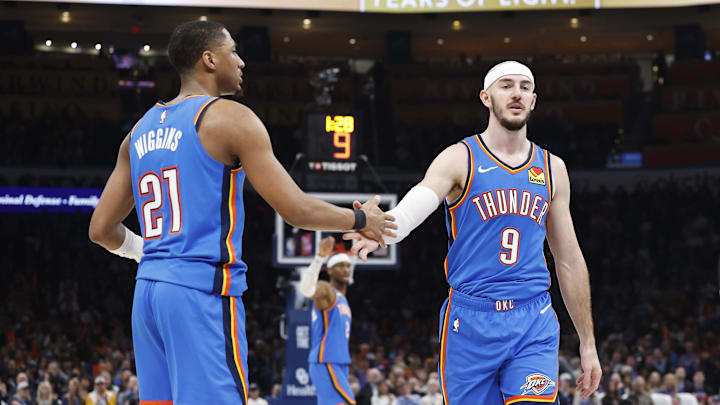 Feb 7, 2025; Oklahoma City, Oklahoma, USA; Oklahoma City Thunder guard Alex Caruso (9) high fives guard Aaron Wiggins (21) after a play against the Toronto Raptors during the second quarter at Paycom Center. Mandatory Credit: Alonzo Adams-Imagn Images Feb 7, 2025; Oklahoma City, Oklahoma, USA; Oklahoma City Thunder guard Alex Caruso (9) high fives guard Aaron Wiggins (21) after a play against the Toronto Raptors during the second quarter at Paycom Center. Mandatory Credit: Alonzo Adams-Imagn Images