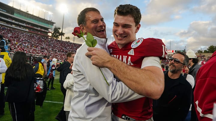 Indiana Hoosiers quarterback Fernando Mendoza (15) hugs Greg Campbell on Thursday, Jan. 1, 2026, after winning the 112th annual Rose Bowl game in Pasadena. Indiana Hoosiers defeated Alabama Crimson Tide, 38-3. Indiana Hoosiers quarterback Fernando Mendoza (15) hugs Greg Campbell on Thursday, Jan. 1, 2026, after winning the 112th annual Rose Bowl game in Pasadena. Indiana Hoosiers defeated Alabama Crimson Tide, 38-3.
