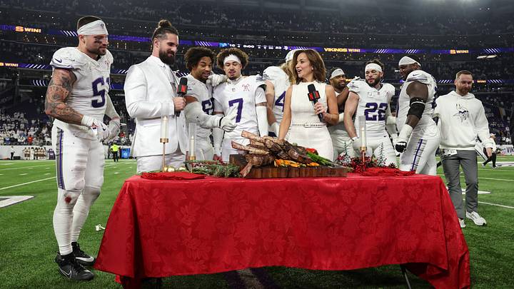 Dec 25, 2025; Minneapolis, Minnesota, USA; The Minnesota Vikings defense is interviewed by WWE Superstar wrestler Seth Rollins and Dianna Russini after the game against the Detroit Lions at U.S. Bank Stadium. Mandatory Credit: Matt Krohn-Imagn Images