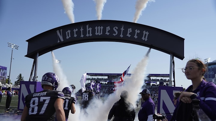 Oct 5, 2024; Evanston, Illinois, USA; The Northwestern Wildcats take the field against the Indiana Hoosiers at Lanny and Sharon Martin Stadium. Mandatory Credit: David Banks-Imagn Images