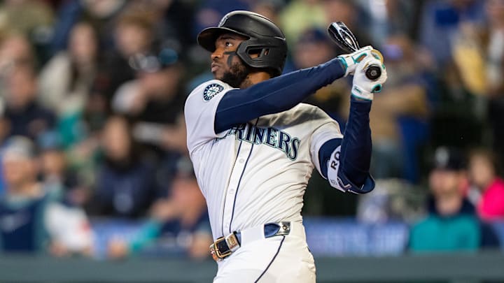 Seattle Mariners right fielder Victor Robles hits a two-run double against the Detroit Tigers on April 2 at T-Mobile Park.