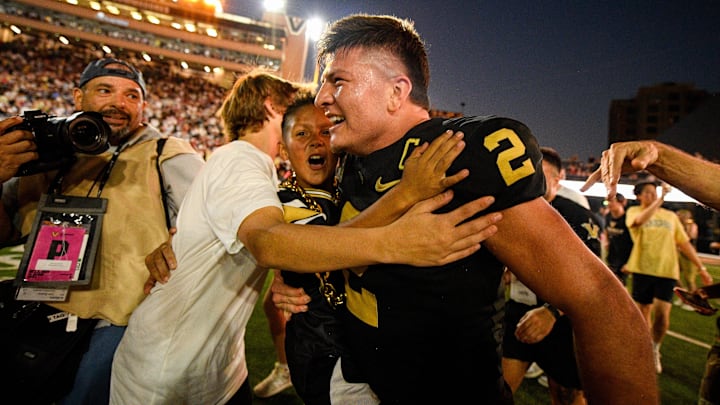 Oct 5, 2024; Nashville, Tennessee, USA;  Vanderbilt Commodores quarterback Diego Pavia (2) celebrates after an upset victory over the Alabama Crimson Tide at FirstBank Stadium. Mandatory Credit: Steve Roberts-Imagn Images