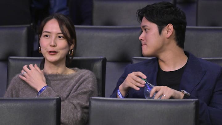Los Angeles Dodgers Shohei Ohtani (17) and his wife Mamiko Tanaka attends the game between the Los Angeles Lakers and the Portland Trail Blazers at Crypto.com Arena.