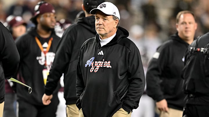 Texas A&M Aggies head coach Jimbo Fisher looks on during warm-ups prior to the game against the Mississippi State Bulldogs