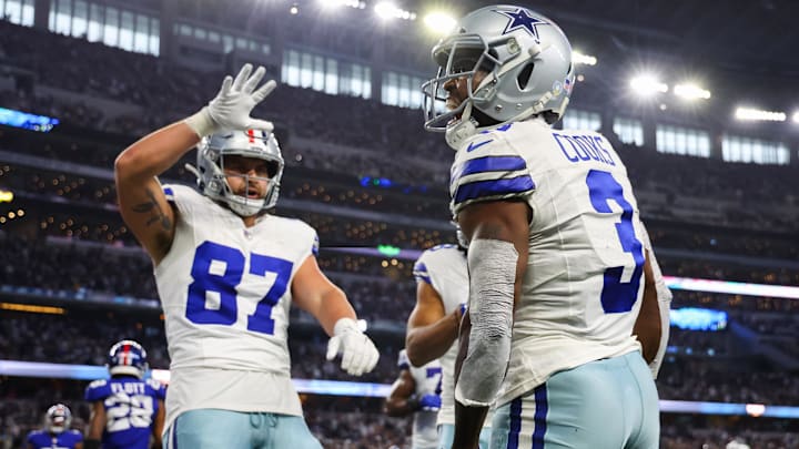 Nov 12, 2023; Arlington, Texas, USA;  Dallas Cowboys wide receiver Brandin Cooks (3) celebrates with Dallas Cowboys tight end Jake Ferguson (87) after catching a touchdown  pass during the second quarter against the New York Giants at AT&T Stadium. Mandatory Credit: Kevin Jairaj-Imagn Images