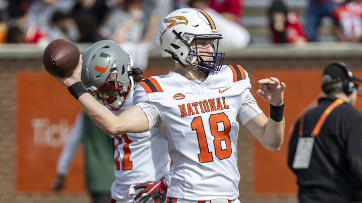 Feb 1, 2025; Mobile, AL, USA; National team quarterback Taylor Elgersma of Laurier (18) warms up before the 2025 Senior Bowl football game at Hancock Whitney Stadium. Mandatory Credit: Vasha Hunt-Imagn Images