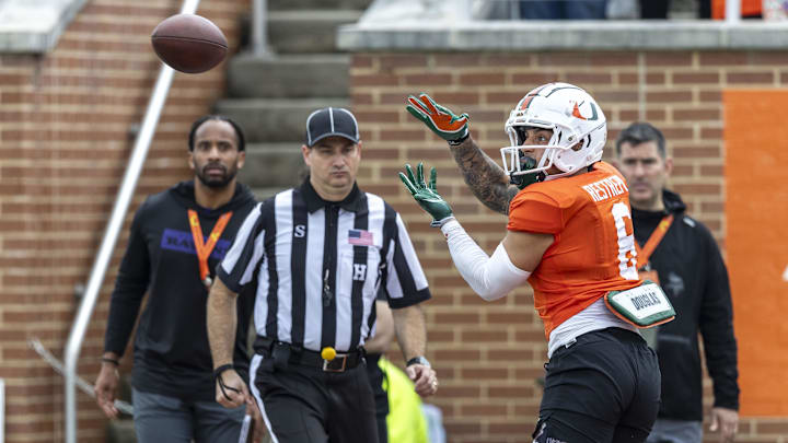 Jan 30, 2025; Mobile, AL, USA; National team wide receiver Xavier Restrepo of Miami (6) grabs a pass during Senior Bowl practice for the National team at Hancock Whitney Stadium. Mandatory Credit: Vasha Hunt-Imagn Images