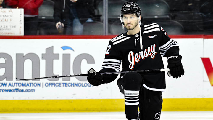 Apr 11, 2025; Newark, New Jersey, USA; New Jersey Devils defenseman Brett Pesce (22) warms up prior to a game against the Pittsburgh Penguins at Prudential Center. Mandatory Credit: John Jones-Imagn Images