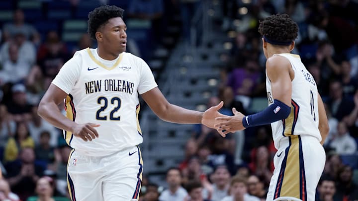 Dec 26, 2025; New Orleans, Louisiana, USA; New Orleans Pelicans center Derik Queen (22) celebrates a basket with guard Jeremiah Fears (0) during the first half against the Phoenix Suns at Smoothie King Center. Mandatory Credit: Matthew Hinton-Imagn Images Dec 26, 2025; New Orleans, Louisiana, USA; New Orleans Pelicans center Derik Queen (22) celebrates a basket with guard Jeremiah Fears (0) during the first half against the Phoenix Suns at Smoothie King Center. Mandatory Credit: Matthew Hinton-Imagn Images