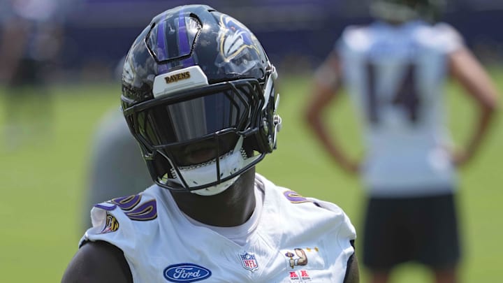 Jul 23, 2025; Owings Mills, MD, USA; Baltimore Ravens linebacker David Ojabo (90) warms up during training camp at Under Armour Performance Center. Mandatory Credit: Mitch Stringer-Imagn Images