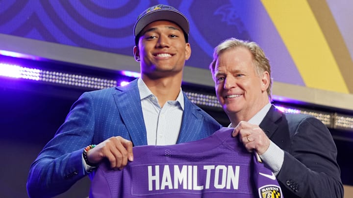 Apr 28, 2022; Las Vegas, NV, USA; Notre Dame safety Kyle Hamilton with NFL commissioner Roger Goodell after being selected as the fourteenth overall pick to the Baltimore Ravens during the first round of the 2022 NFL Draft at the NFL Draft Theater. 