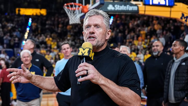 Michigan football head coach Kyle Whittingham speaks as he is being introduced on the floor during the first half between Michigan and USC at Crisler Center in Ann Arbor on Friday, Jan. 2, 2026.