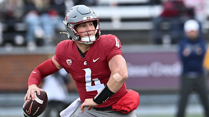 Oct 25, 2025; Pullman, Washington, USA; Washington State Cougars quarterback Zevi Eckhaus (4) drops back for a pass against the Toledo Rockets in the first half at Gesa Field at Martin Stadium. Mandatory Credit: James Snook-Imagn Images Oct 25, 2025; Pullman, Washington, USA; Washington State Cougars quarterback Zevi Eckhaus (4) drops back for a pass against the Toledo Rockets in the first half at Gesa Field at Martin Stadium. Mandatory Credit: James Snook-Imagn Images