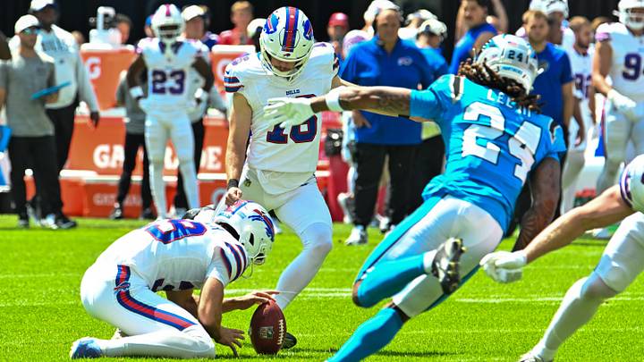 Buffalo Bills kicker Tyler Bass makes a field goal with holder Mitch Wishnowsky as Carolina Panthers DB Will Lee rushes. Buffalo Bills kicker Tyler Bass makes a field goal with holder Mitch Wishnowsky as Carolina Panthers DB Will Lee rushes.