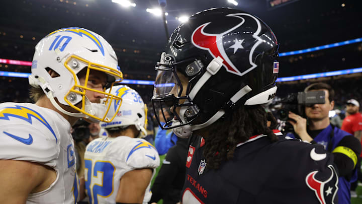 Houston Texans quarterback C.J. Stroud and Los Angeles Chargers quarterback Justin Herbert after defeating the Los Angeles Chargers in an AFC wild card game at NRG Stadium. 
