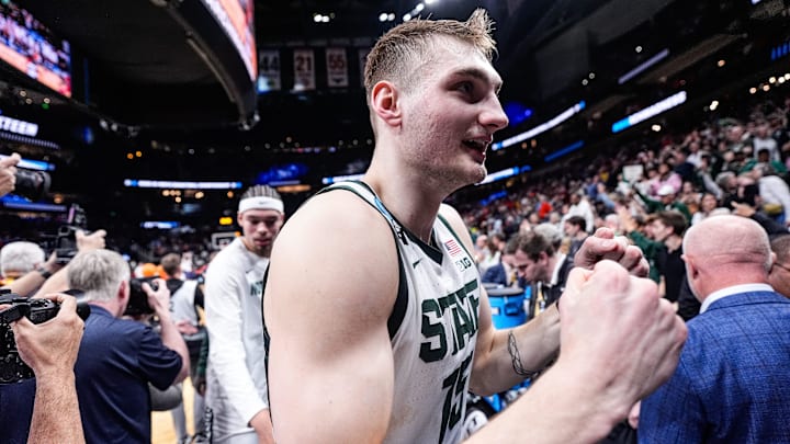 Michigan State center Carson Cooper (15) celebrate 73-70 win over Ole Miss at the Sweet 16 round of NCAA tournament at State Farm Arena in Atlanta, Ga. on Friday, March 28, 2025.