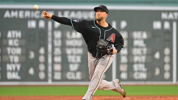 August 18, 2026; Boston, Massachusetts, USA; Arizona Diamondbacks starting pitcher Merrill Kelly (29) pitches against the Boston Red Sox during the first inning at Fenway Park. Mandatory Credit: Eric Canha-Imagn Images August 18, 2026; Boston, Massachusetts, USA; Arizona Diamondbacks starting pitcher Merrill Kelly (29) pitches against the Boston Red Sox during the first inning at Fenway Park. Mandatory Credit: Eric Canha-Imagn Images